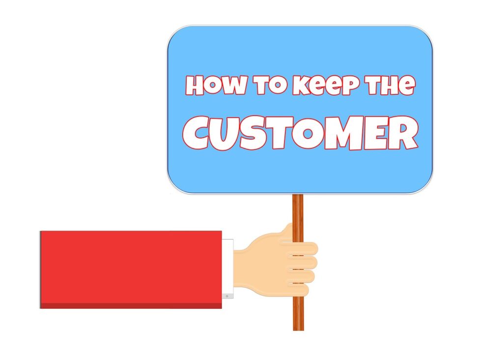 Hand holding a sign with How to Keep the Customer written on it