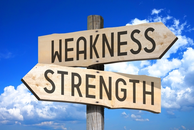 weakness-strength-wooden-signpost-how to learn to delegate