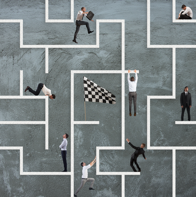 Businessmen-navigating-a-maze-of-obstacles - Challenges to Going Paperless