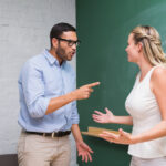 Two casual business colleagues in an argument at office - Ways to Deal with Difficult People