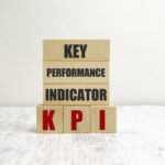 wooden cube block with kpi key, performance and indicator word on table background - 2 Overlooked Ideas for Business Improvement that Make Impact