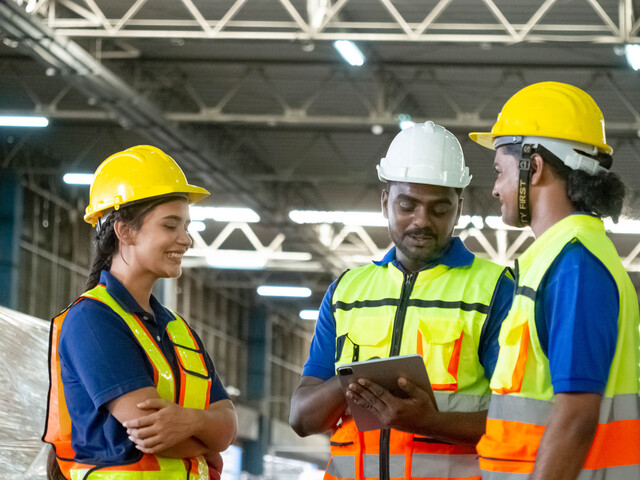 employee-white-hardhat-helmet-safety-uniform-factory-company-teamwork - Best Practices Hiring Process