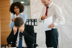 employee-being-bullied-by-manager-and-colleague. - How a Toxic Environment Affects mental health