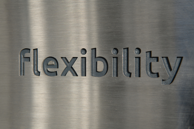 Engraving of flexibility text on a piece of metal - 8 Strategies to get Better Work Life Balance