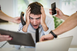 frustrated overworked businessman-What are the Best Ways to Manage Stress Like a Pro