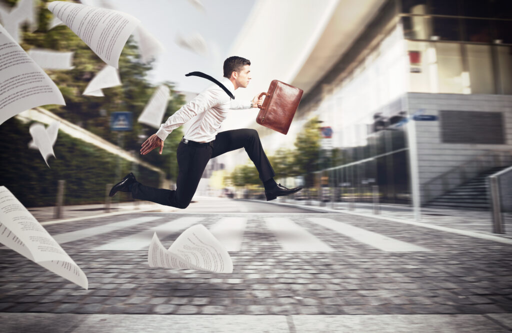 Stressed man working at full speed all the way from home to the office- 7 Sources of Stress Life that Affect Work Productivity