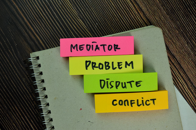 problem-dispute-conflict-words-written-on-sticky-notes-isolated-on-wooden-table - How to Resolve a Conflict in the Workplace