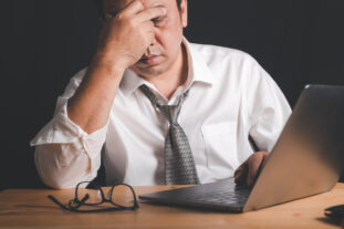 stressed businessm - Strategies for Reducing Inefficiencies in Business