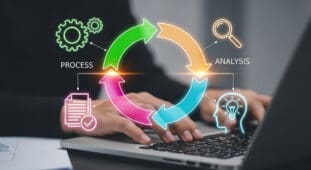 person-working-on-laptop-managing-a-business-process-How to Write the Operations Section of a Business Plan